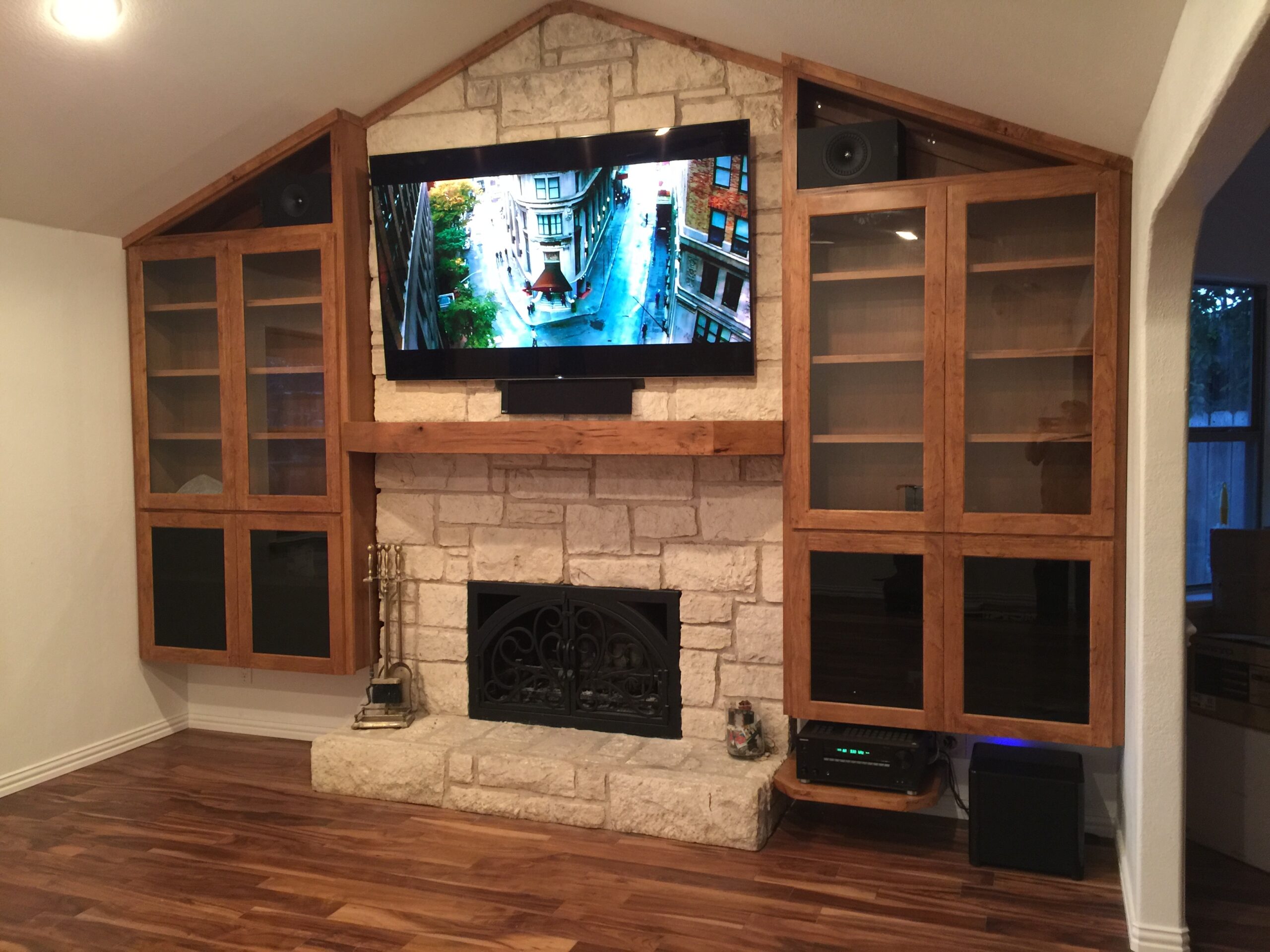 TV mounted above fireplace