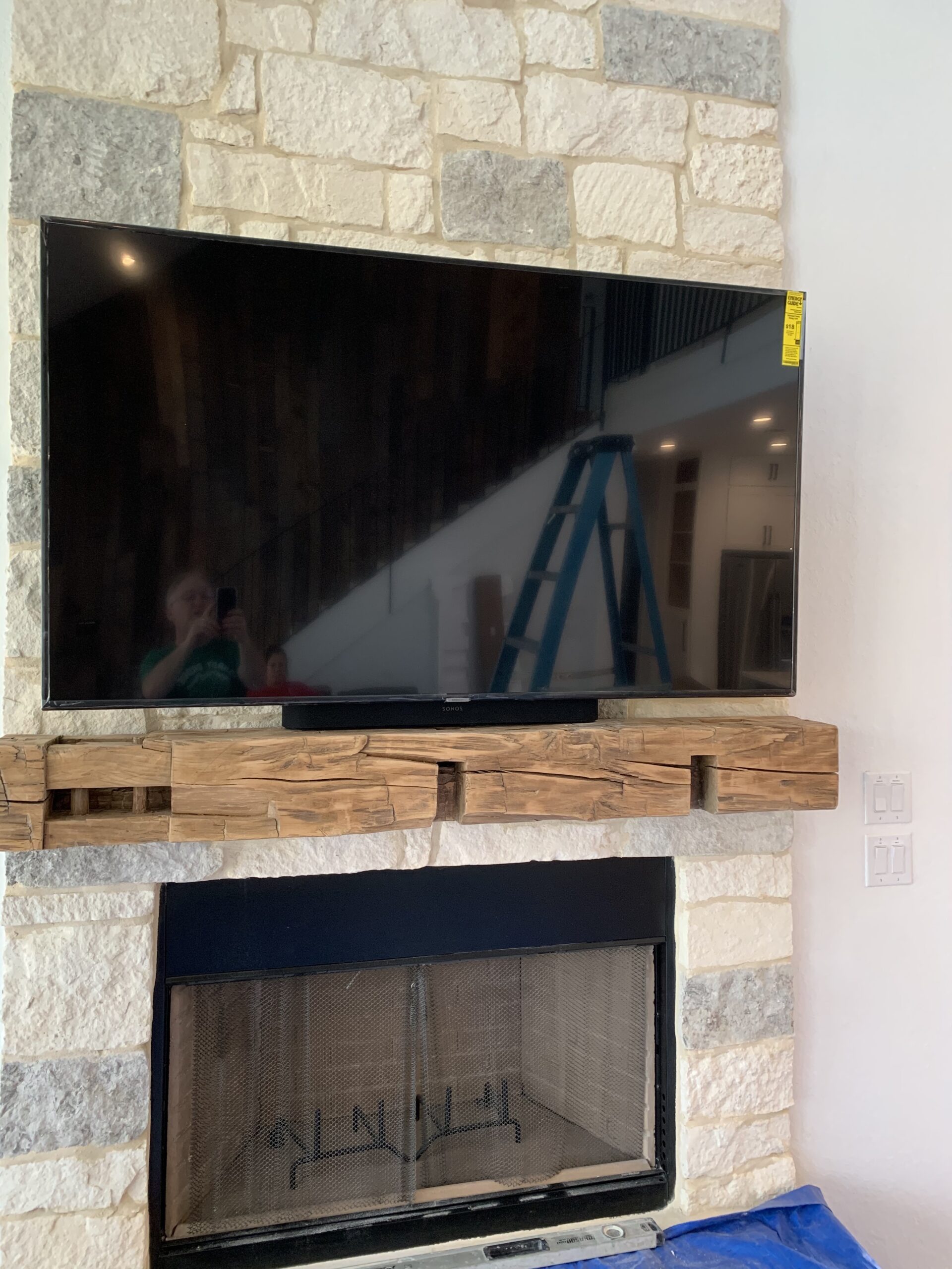 fireplace mounted TV install and home speakers