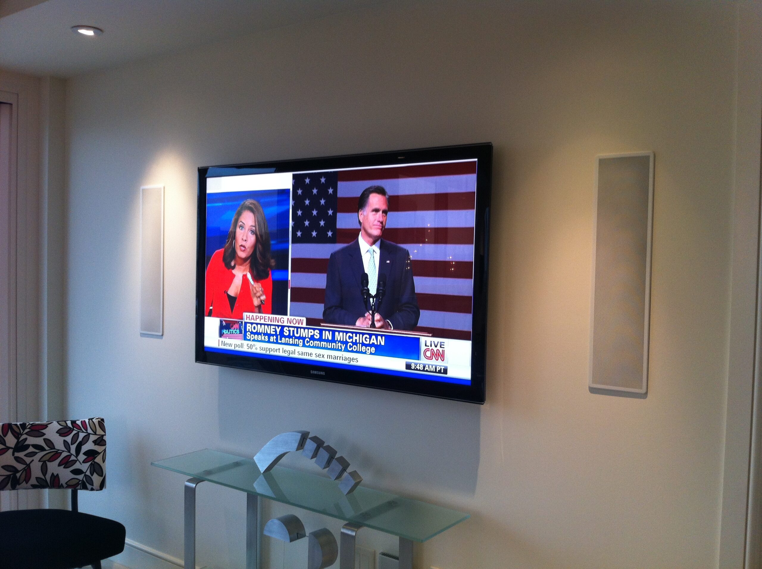Framed smart TV and integrated full home sound system