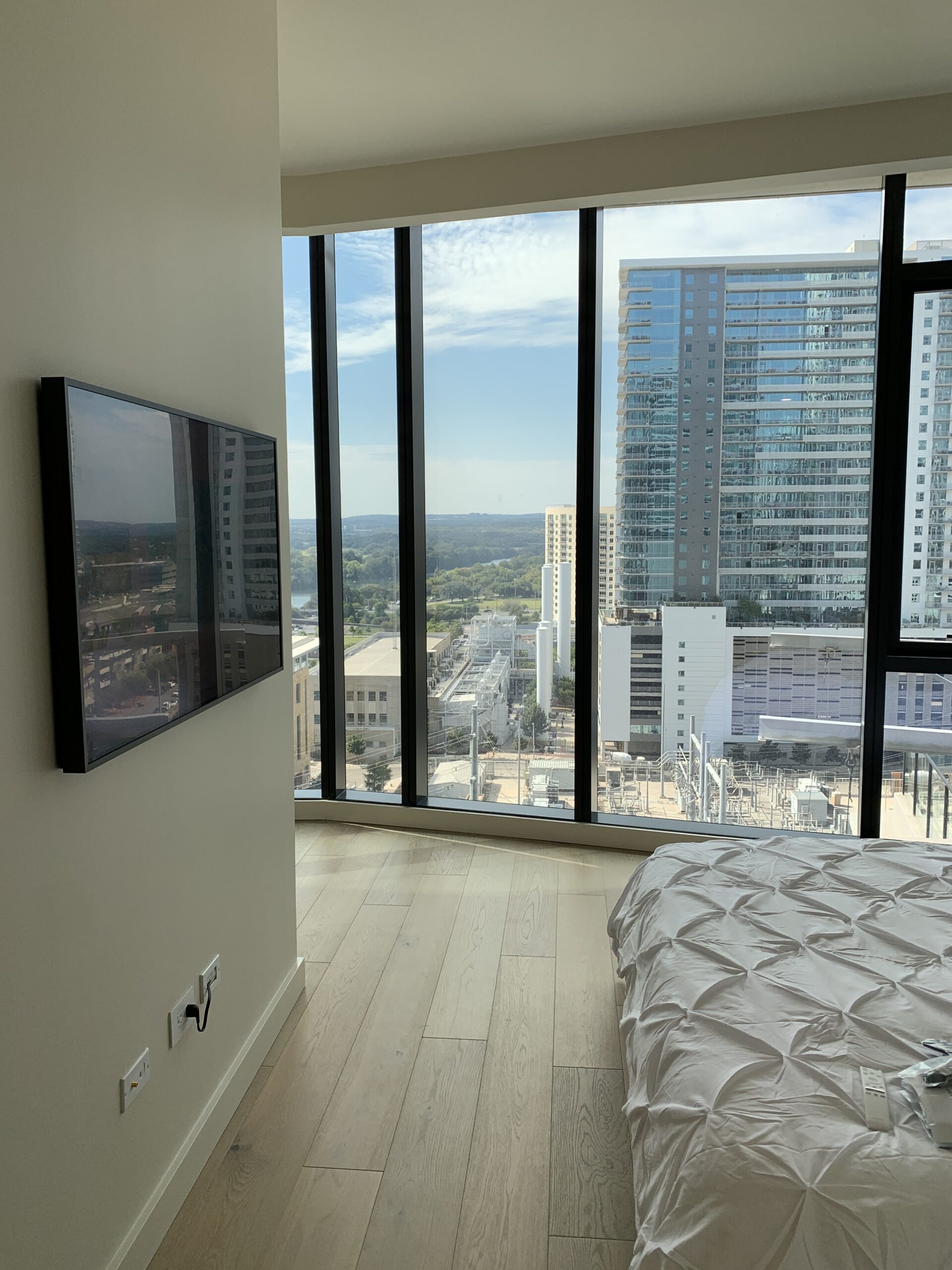 Luxury condo integrated with smart Samsung framed TV, surround sound and a simple smart system
